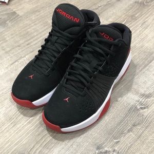 Men’s black and red Jordan’s